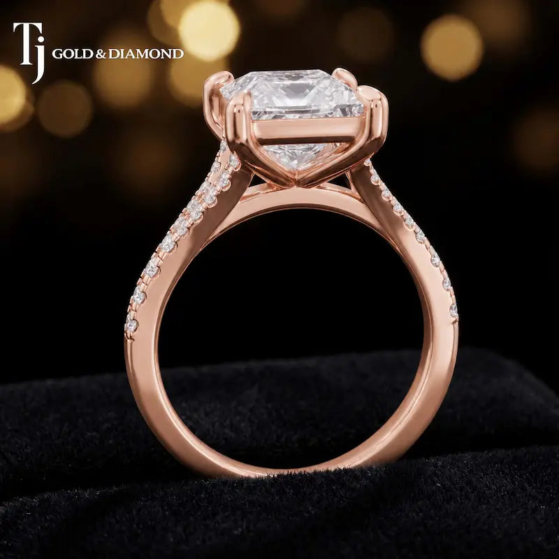 Side view of a princess cut split shank lab-grown diamond engagement ring featuring a four-claw cathedral setting in 18kt rose gold.