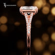 Side profile of a radiant cut split shank lab-grown diamond engagement ring with diamond-set shoulders in 18kt rose gold.
