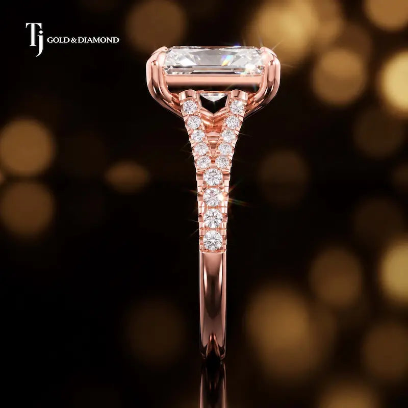 Side profile of a radiant cut split shank lab-grown diamond engagement ring with diamond-set shoulders in 18kt rose gold.