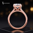 Side view of a radiant cut split shank lab-grown diamond engagement ring featuring a four-claw cathedral setting in 18kt rose gold.