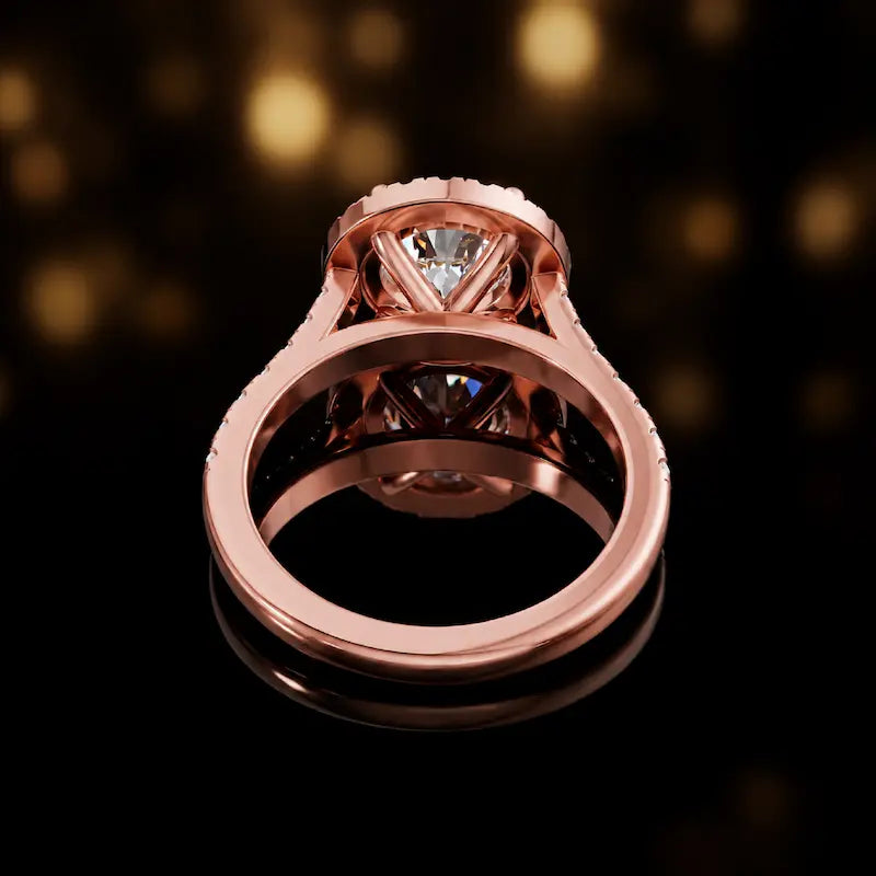 Rear view of a round cut halo lab-grown diamond engagement ring in 18kt rose gold.