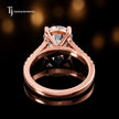 Back view of a round cut split shank lab-grown diamond engagement ring in 18kt rose gold.