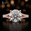Front view of a round cut split shank lab-grown diamond engagement ring in 18kt rose gold.
