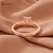 Back view of a 1.5 carat radiant cut diamond solitaire engagement ring showing the 18kt rose gold band and 4 claw setting by TJ Diamond