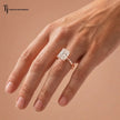 1.5 carat radiant cut diamond solitaire engagement ring in an 18kt rose gold 4 claw setting worn on a hand, by TJ Diamond