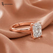 Angled side view of a 1.5 carat radiant cut diamond solitaire engagement ring in an 18kt rose gold 4 claw setting by TJ Diamond