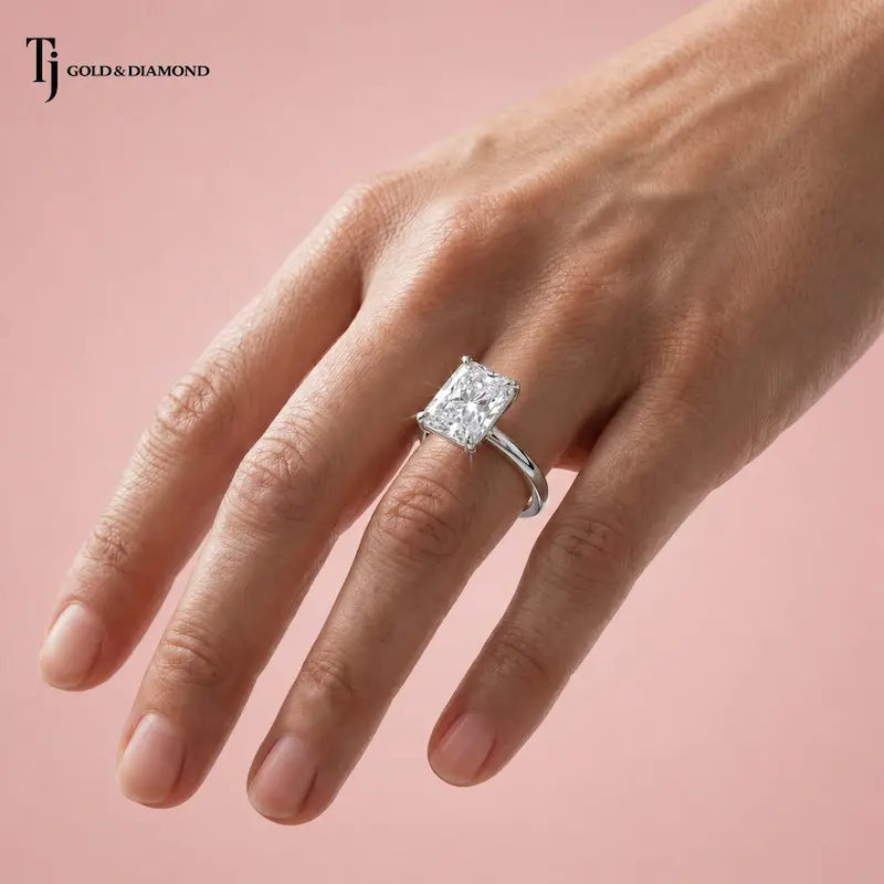 1.5 carat radiant cut lab-grown diamond solitaire engagement ring in 18kt white gold worn on the hand