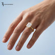 1.5 carat radiant cut lab-grown diamond solitaire engagement ring in 18kt yellow gold worn on the hand