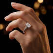 1.5 carat radiant cut diamond solitaire engagement ring in an 18kt white gold 6 claw setting worn on a hand, by TJ Diamond