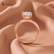 Front-on standing view of a 1.5 carat round cut lab-grown diamond solitaire engagement ring in 18kt rose gold showing the band profile