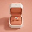 1.5 carat round cut lab-grown diamond solitaire engagement ring in 18kt rose gold in a TJ Diamond box