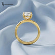 Front-on standing view of a 1.5 carat round cut lab-grown diamond solitaire engagement ring in 18kt yellow gold showing the band profile
