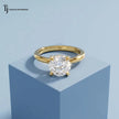 Front view of a 1.5 carat round cut lab-grown diamond solitaire engagement ring in 18kt yellow gold with a 4-claw setting