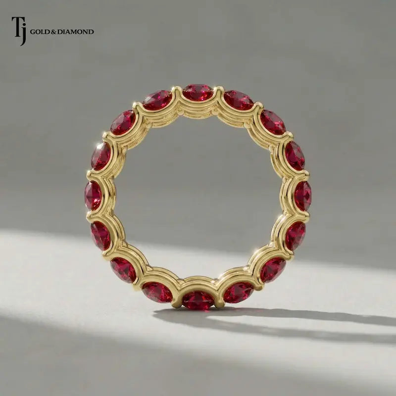 Luxury created ruby full eternity ring crafted in 18kt yellow gold with round brilliant lab-created rubies.