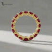 Luxury created ruby full eternity ring crafted in 18kt yellow gold with round brilliant lab-created rubies.