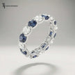Luxury Created Sapphire & Lab-Grown Diamond Full Eternity Ring in 18kt White Gold showcasing alternating round blue sapphires and brilliant diamonds.