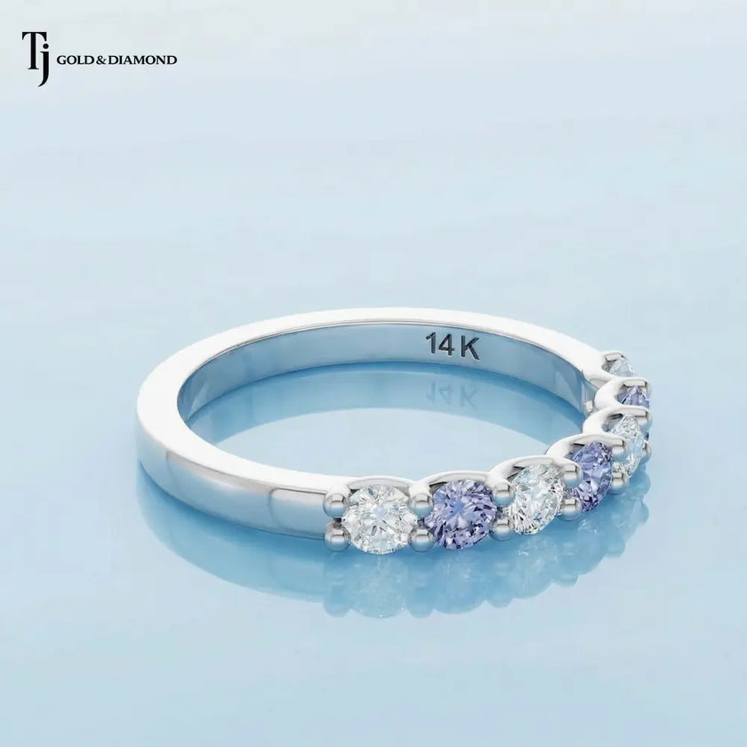 Side View of an Alternating Lab-Created Sapphire & Lab-Grown Diamond Half Eternity Ring in 18kt white gold.