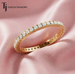 Scallop setting full eternity diamond wedding band in 18kt yellow gold with round brilliant lab-grown diamonds.