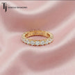 Full eternity diamond wedding band featuring a shared prong setting in 18kt yellow gold with round brilliant lab-grown diamonds.