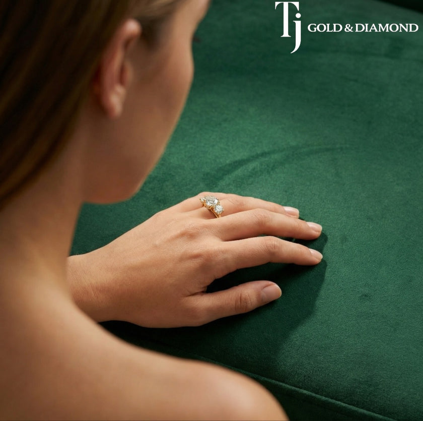 Three-Stone Round Brilliant Diamond Ring with Diamond Shoulders - Yellow Gold