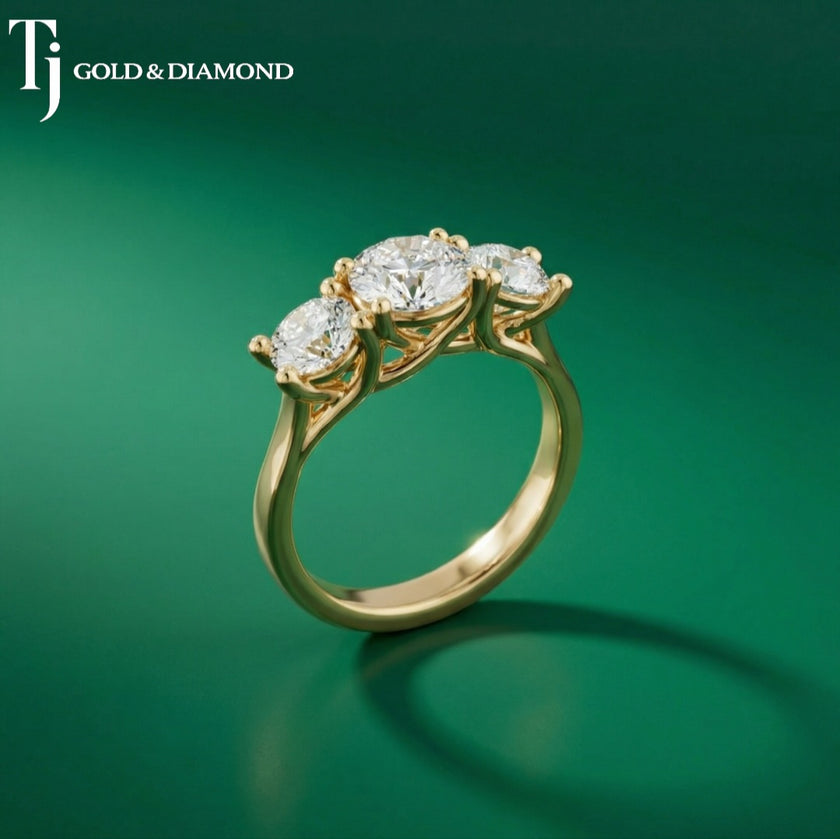 Three-Stone Round Brilliant Diamond Ring with Diamond Shoulders - Yellow Gold