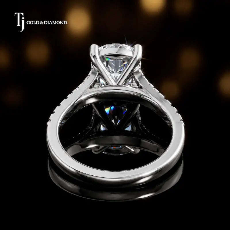 Back view of a cushion cut split shank lab-grown diamond engagement ring in 18kt white gold.