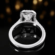 Rear view of an emerald cut halo lab-grown diamond engagement ring in 18kt white gold.