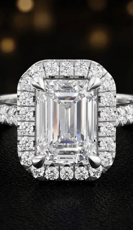 Front view of an emerald cut halo lab-grown diamond engagement ring in 18kt white gold.