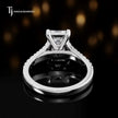 Back view of an emerald cut split shank lab-grown diamond engagement ring in 18kt white gold.