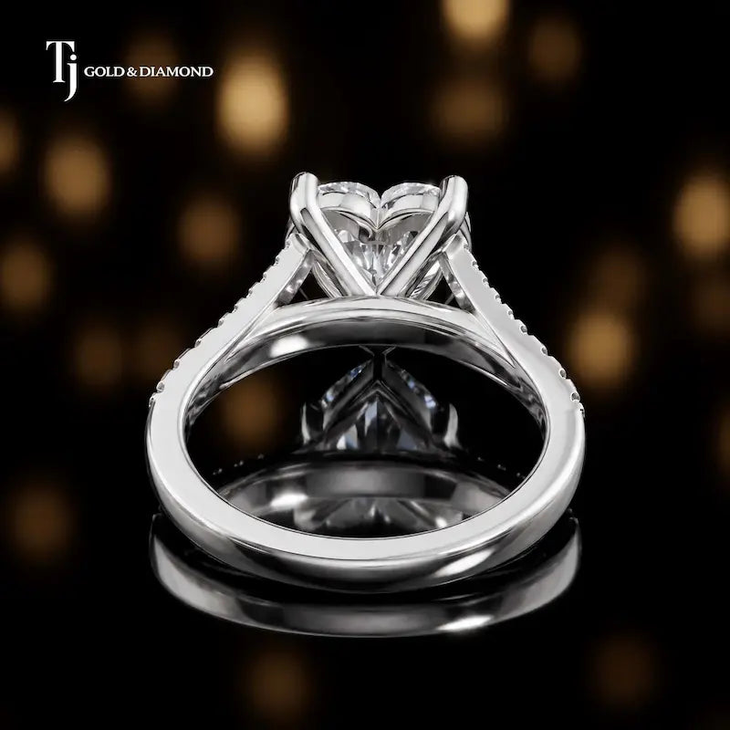 Back view of a heart cut split shank lab-grown diamond engagement ring in 18kt white gold.