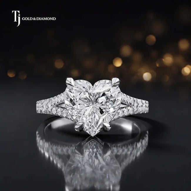 Front view of a heart cut split shank lab-grown diamond engagement ring in 18kt white gold.