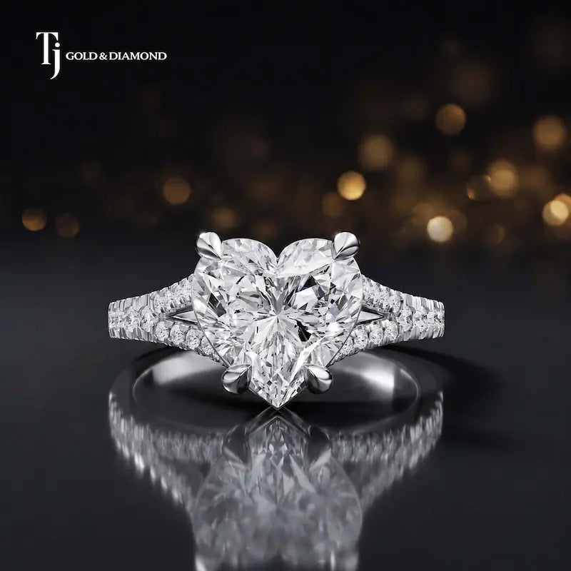 Front view of a heart cut split shank lab-grown diamond engagement ring in 18kt white gold.