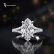Front view of a marquise cut split shank lab-grown diamond engagement ring in 18kt white gold.
