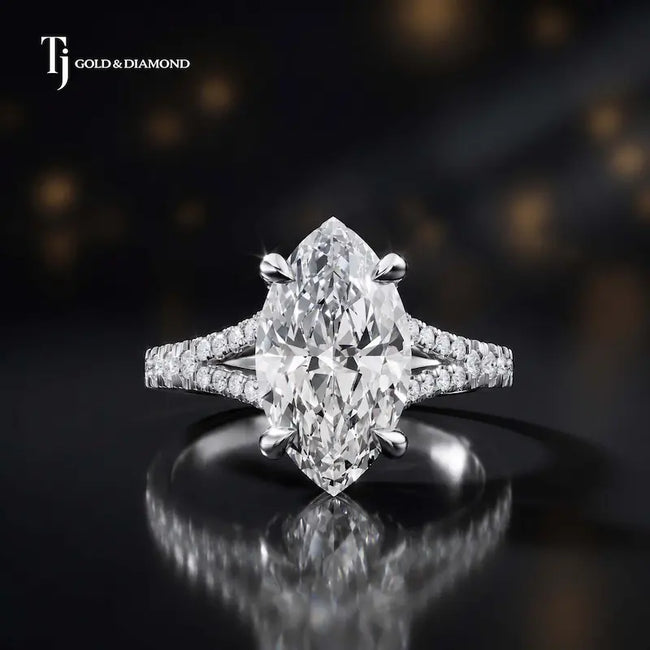 Front view of a marquise cut split shank lab-grown diamond engagement ring in 18kt white gold.