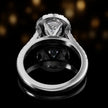 Rear view of an oval cut halo lab-grown diamond engagement ring in 18kt white gold.