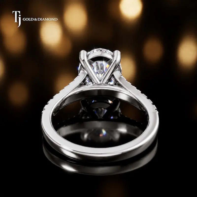 Back view of an oval cut split shank lab-grown diamond engagement ring in 18kt white gold.