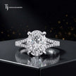 Front view of an oval cut split shank lab-grown diamond engagement ring in 18kt white gold.