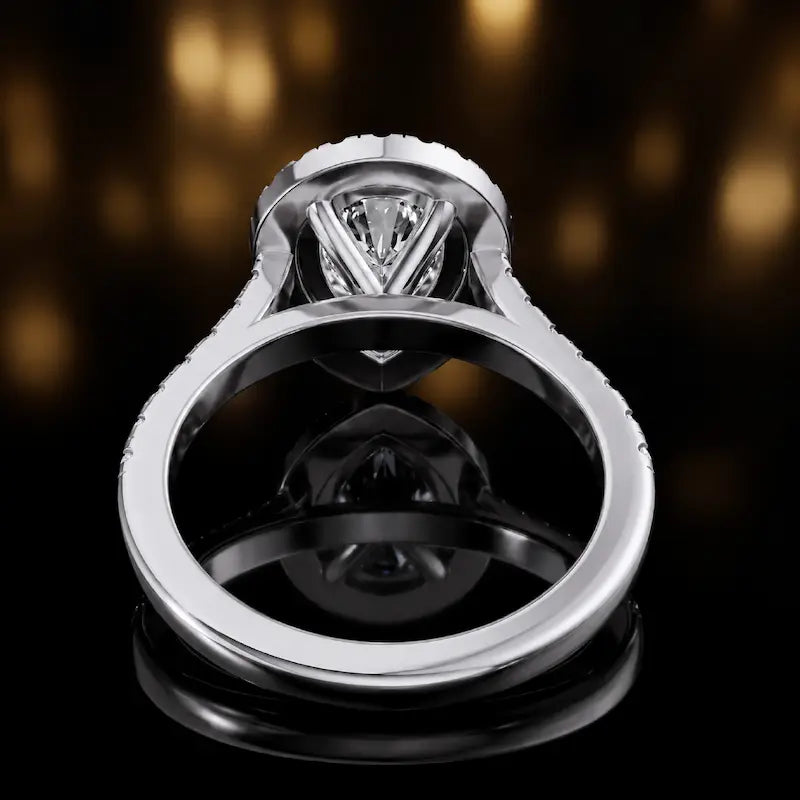 Rear view of a pear cut halo lab-grown diamond engagement ring in 18kt white gold.