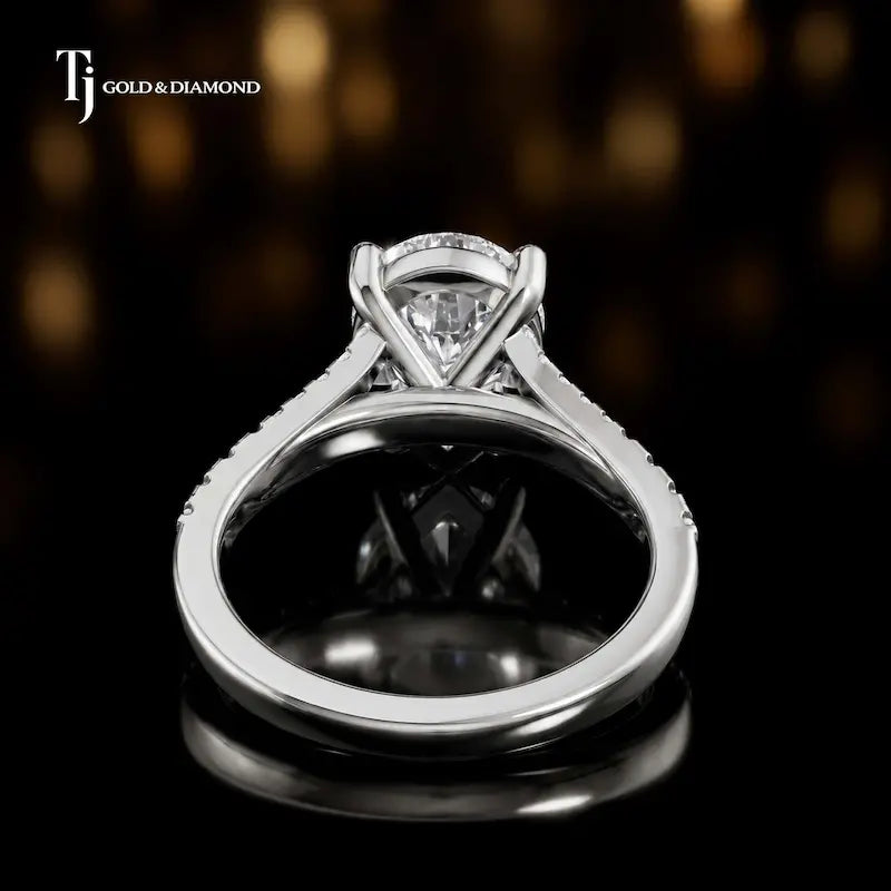 Back view of a pear cut split shank lab-grown diamond engagement ring in 18kt white gold.
