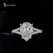 Front view of a pear cut split shank lab-grown diamond engagement ring in 18kt white gold.