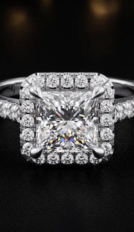 Front view of a princess cut halo lab-grown diamond engagement ring in 18kt white gold.