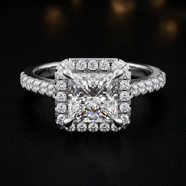 Front view of a princess cut halo lab-grown diamond engagement ring in 18kt white gold.