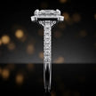 Side profile of a princess cut halo lab-grown diamond engagement ring in 18kt white gold.
