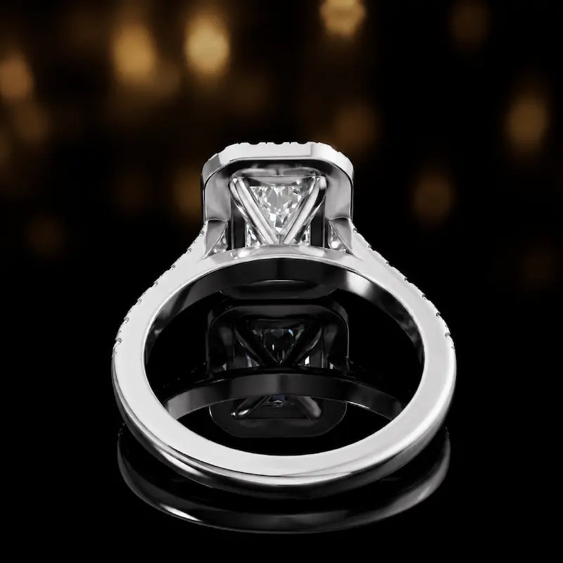 Rear view of a radiant cut halo lab-grown diamond engagement ring in 18kt white gold.