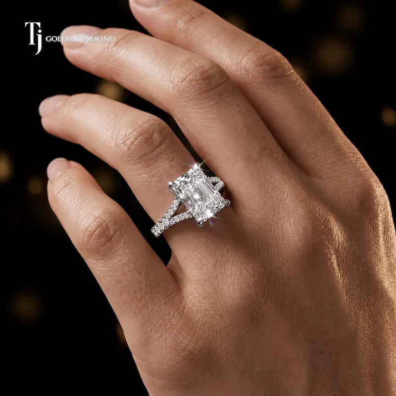 Radiant cut split shank lab-grown diamond engagement ring worn on hand in 18kt white gold.