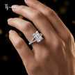 Radiant cut split shank lab-grown diamond engagement ring worn on hand in 18kt white gold.