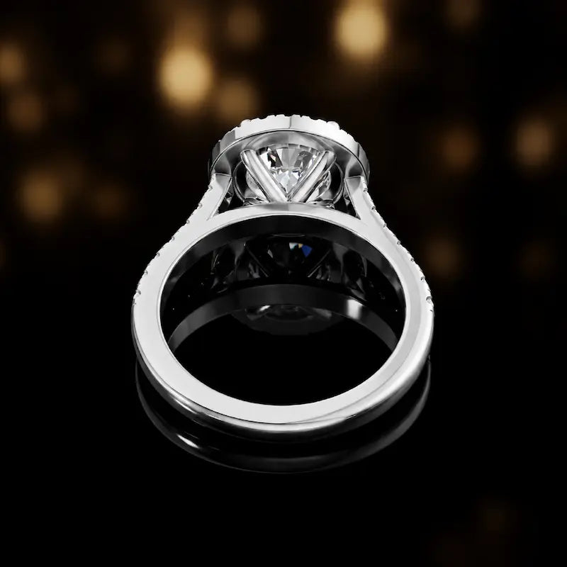 Rear view of a round cut halo lab-grown diamond engagement ring in 18kt white gold.