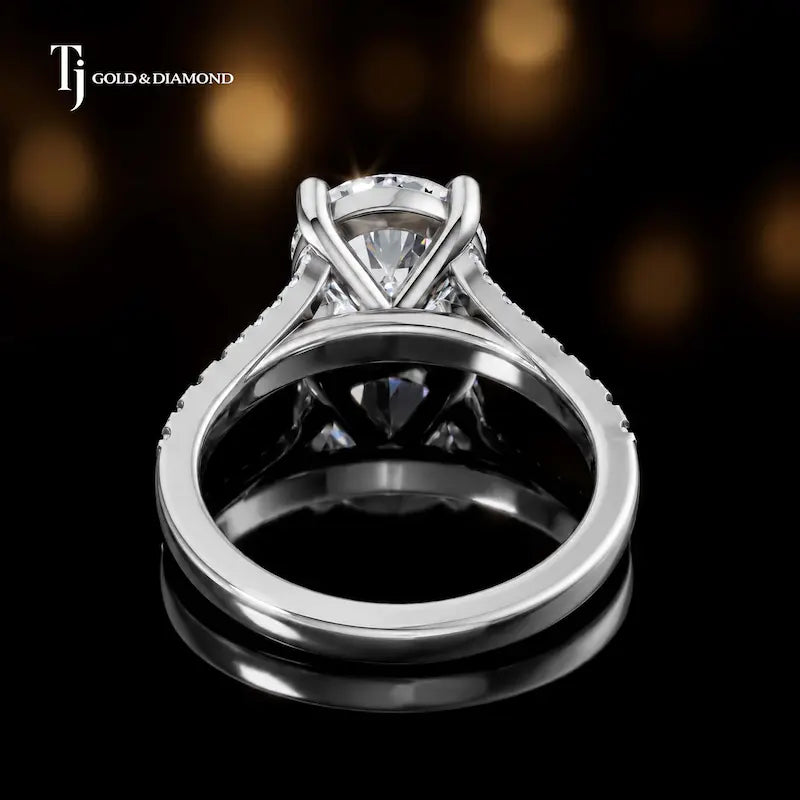Back view of a round cut split shank lab-grown diamond engagement ring in 18kt white gold.
