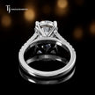 Back view of a round cut split shank lab-grown diamond engagement ring in 18kt white gold.