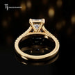 Back view of an emerald cut split shank lab-grown diamond engagement ring in 18kt yellow gold.